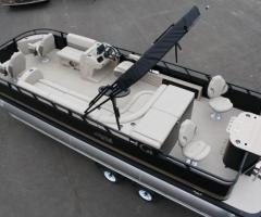 New 25 triple tube pontoon boat with a new 300 hp and trailer